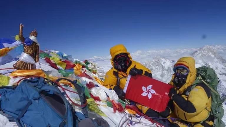 Ada and her climbing guide Mingma Nuru at top of Everest